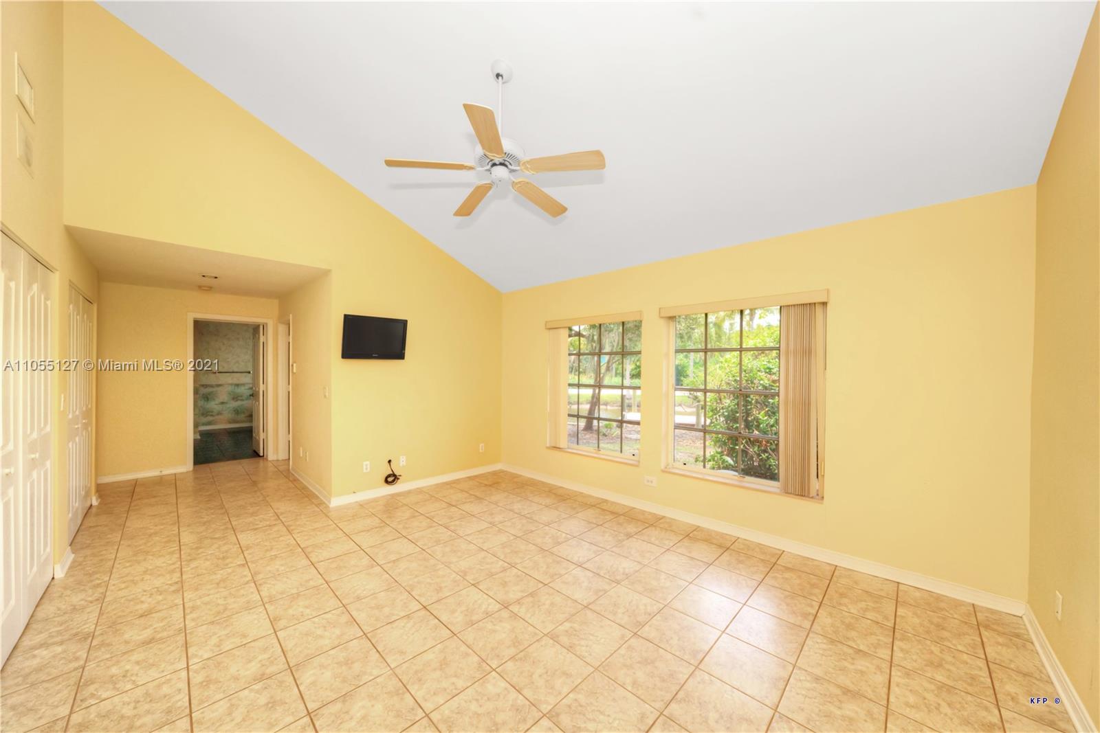 540 Southwest Salerno Road Stuart, FL 34997 - Photo 12 of 44 a view of an empty room with a window