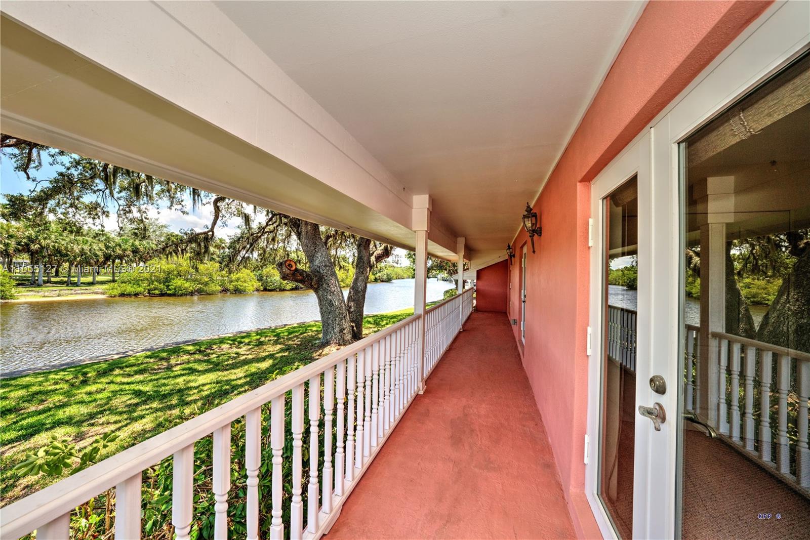 540 Southwest Salerno Road Stuart, FL 34997 - Photo 27 of 44 a view of swimming pool from a balcony