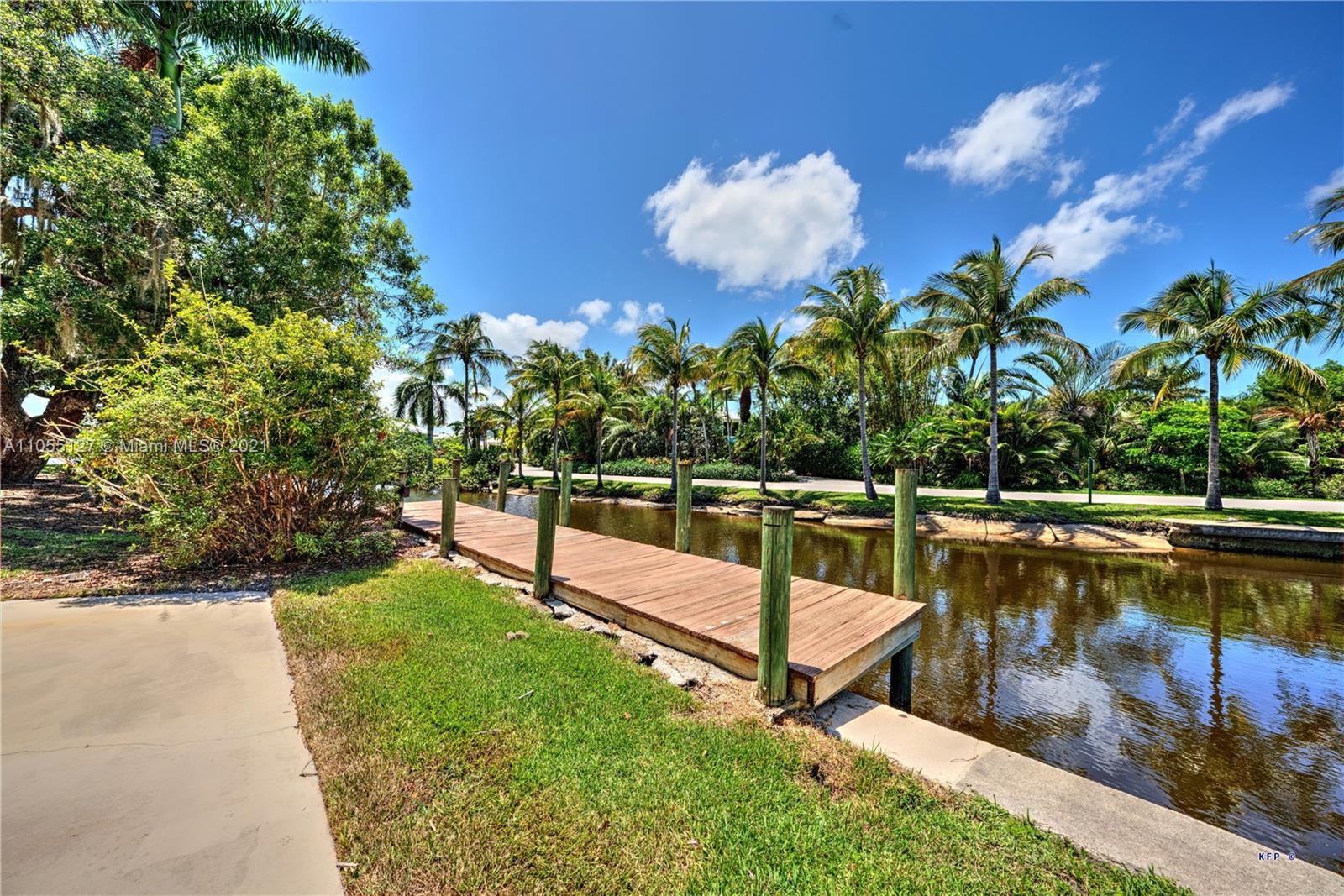 540 Southwest Salerno Road Stuart, FL 34997 - Photo 31 of 44 a view of a swimming pool with a lake view