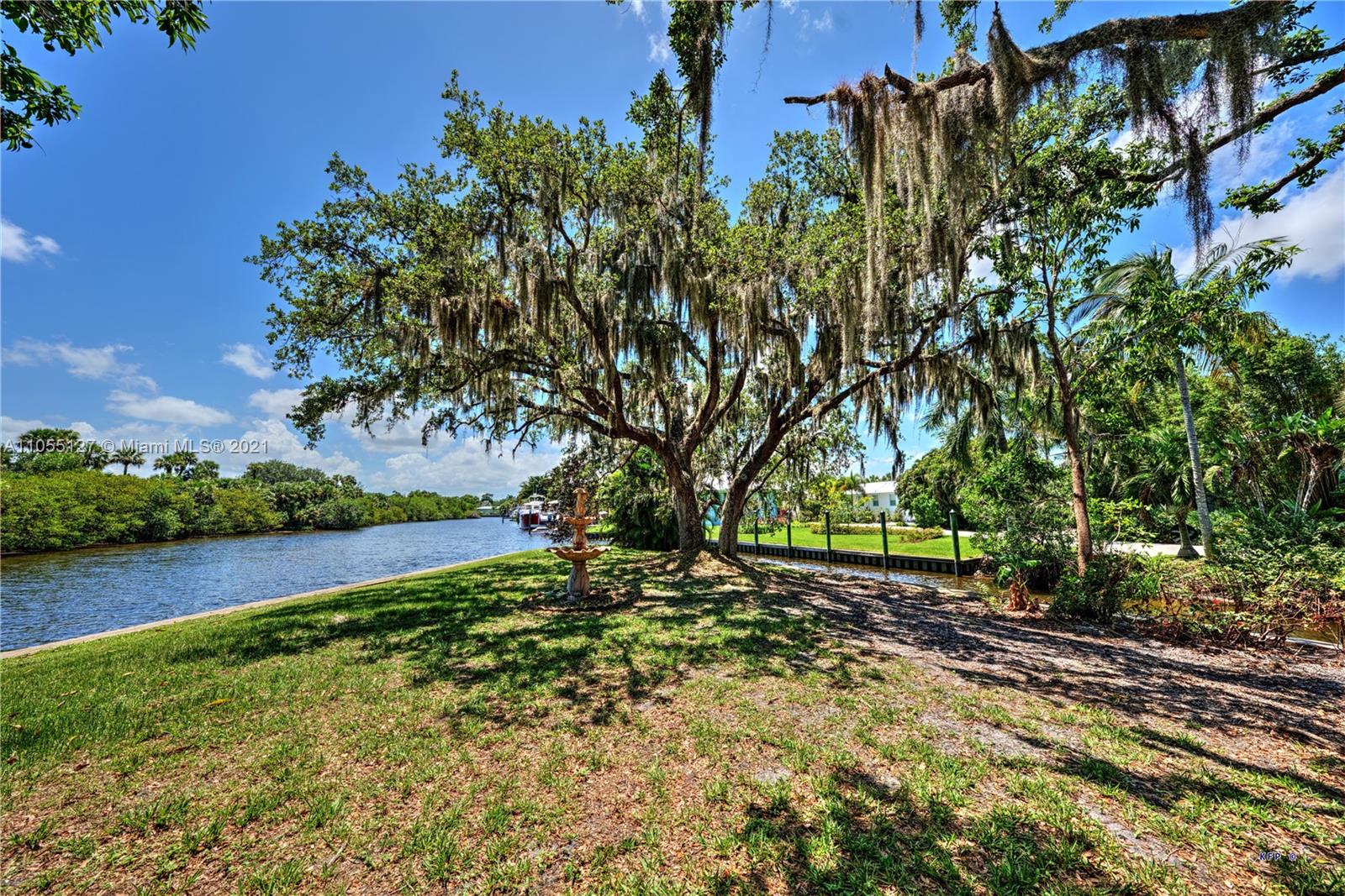 540 Southwest Salerno Road Stuart, FL 34997 - Photo 35 of 44 a view of a yard with a tree