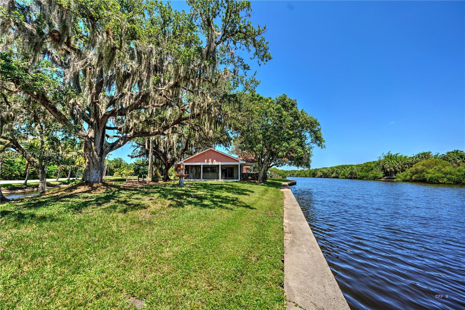 540 Southwest Salerno Road Stuart, FL 34997 - Photo 37 of 44 a view of a pathway with a yard