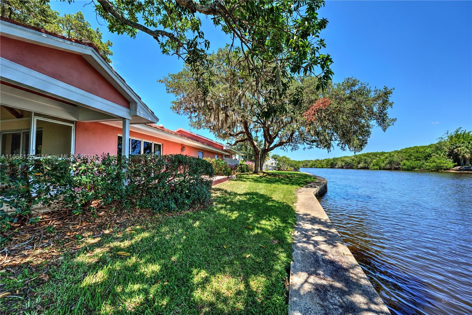 540 Southwest Salerno Road Stuart, FL 34997 - Photo 39 of 44 a view of a house with a yard