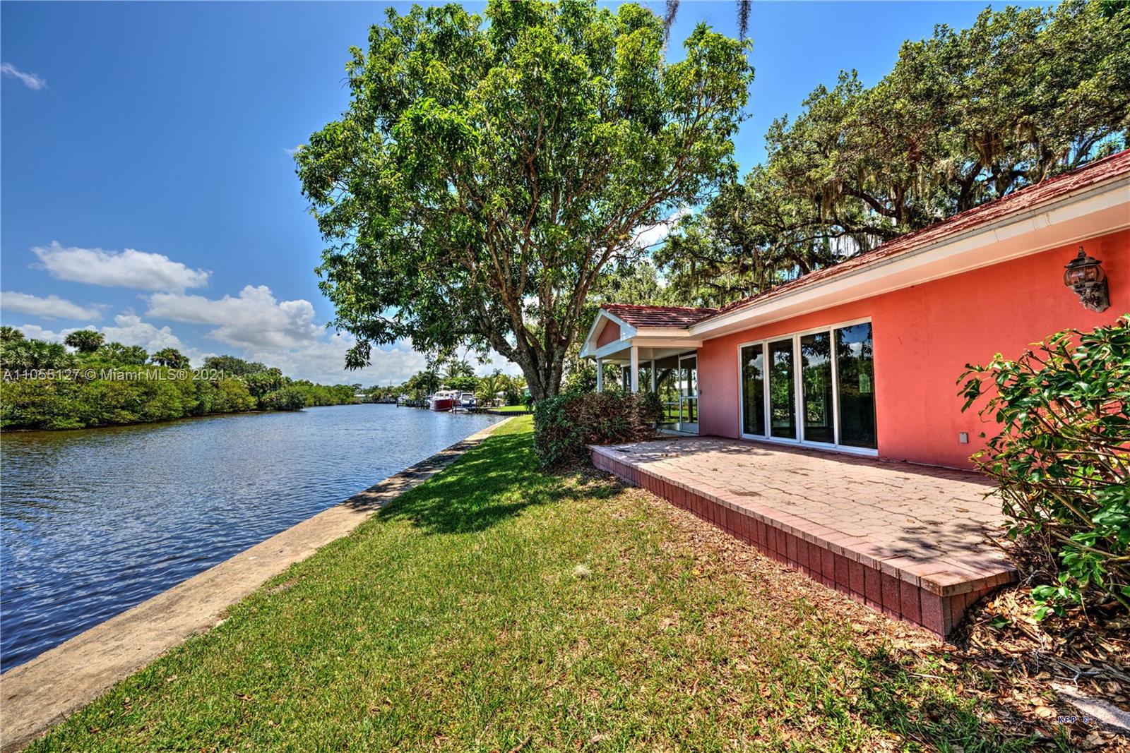 540 Southwest Salerno Road Stuart, FL 34997 - Photo 40 of 44 a view of a house with backyard and garden