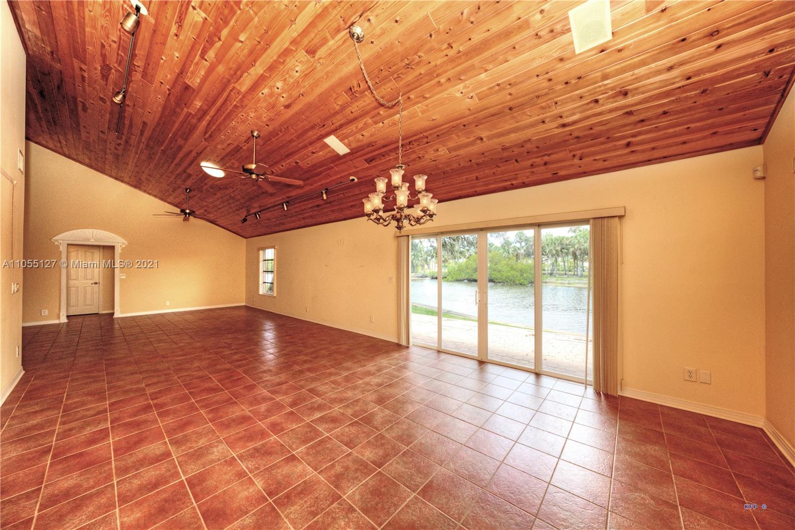 540 Southwest Salerno Road Stuart, FL 34997 - Photo 8 of 44 a view of an empty room with a window