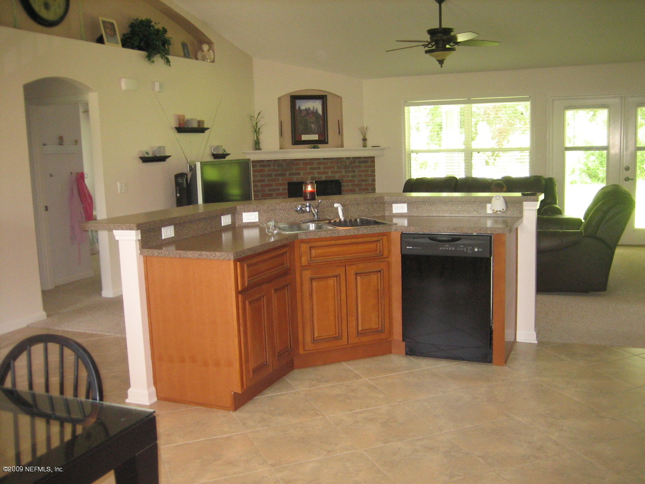 203 Brickyard Road Middleburg, FL 32068 - Photo 8 of 28 a kitchen with stainless steel appliances granite countertop a stove and a sink