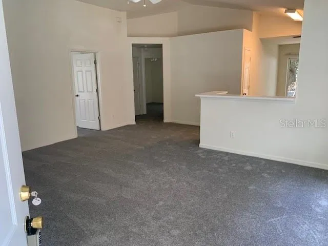 a kitchen with stainless steel appliances a stove a sink a refrigerator and cabinets