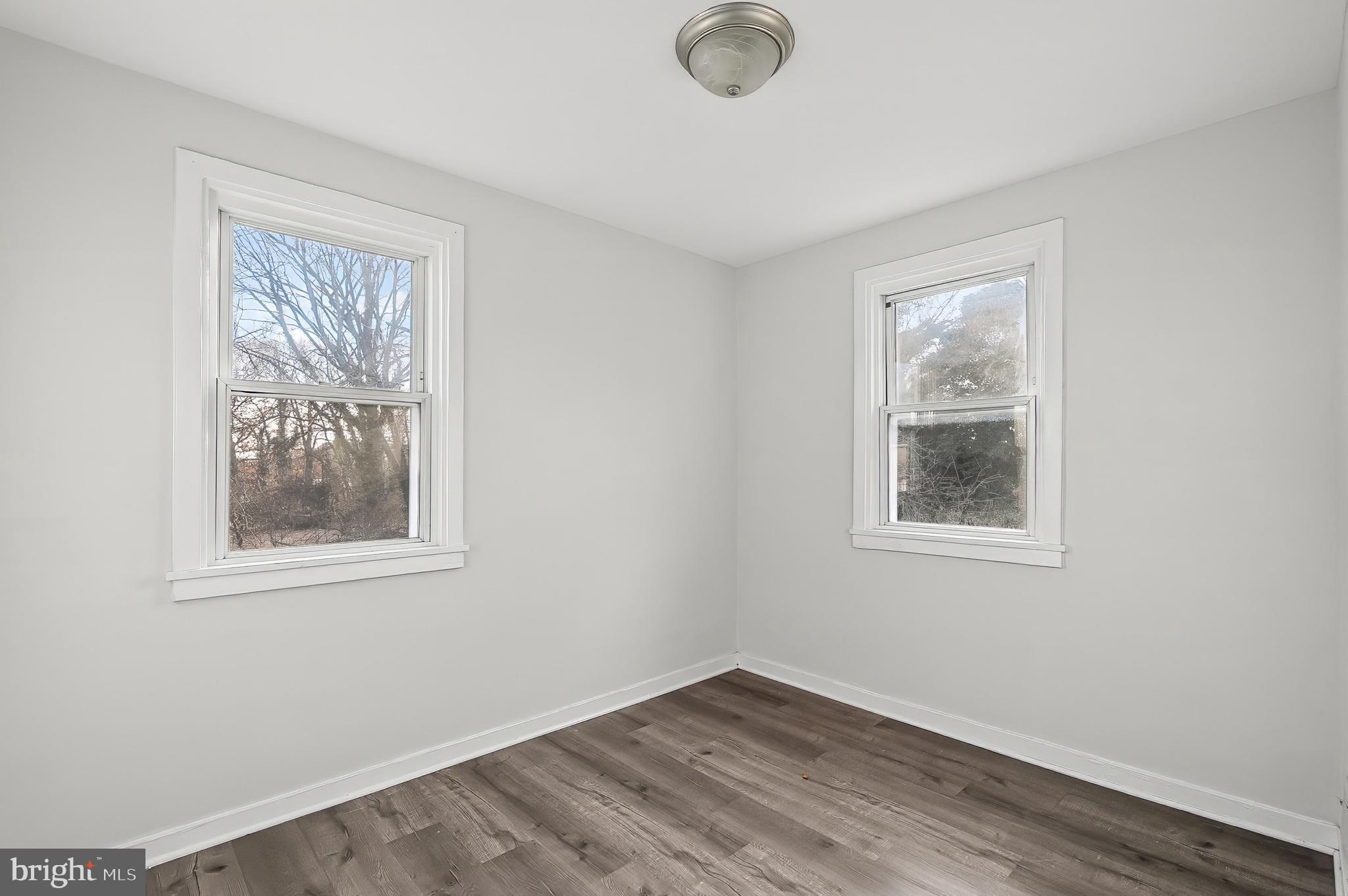 30 North Athol Avenue Baltimore, MD 21229 - Photo 15 of 20 an empty room with windows