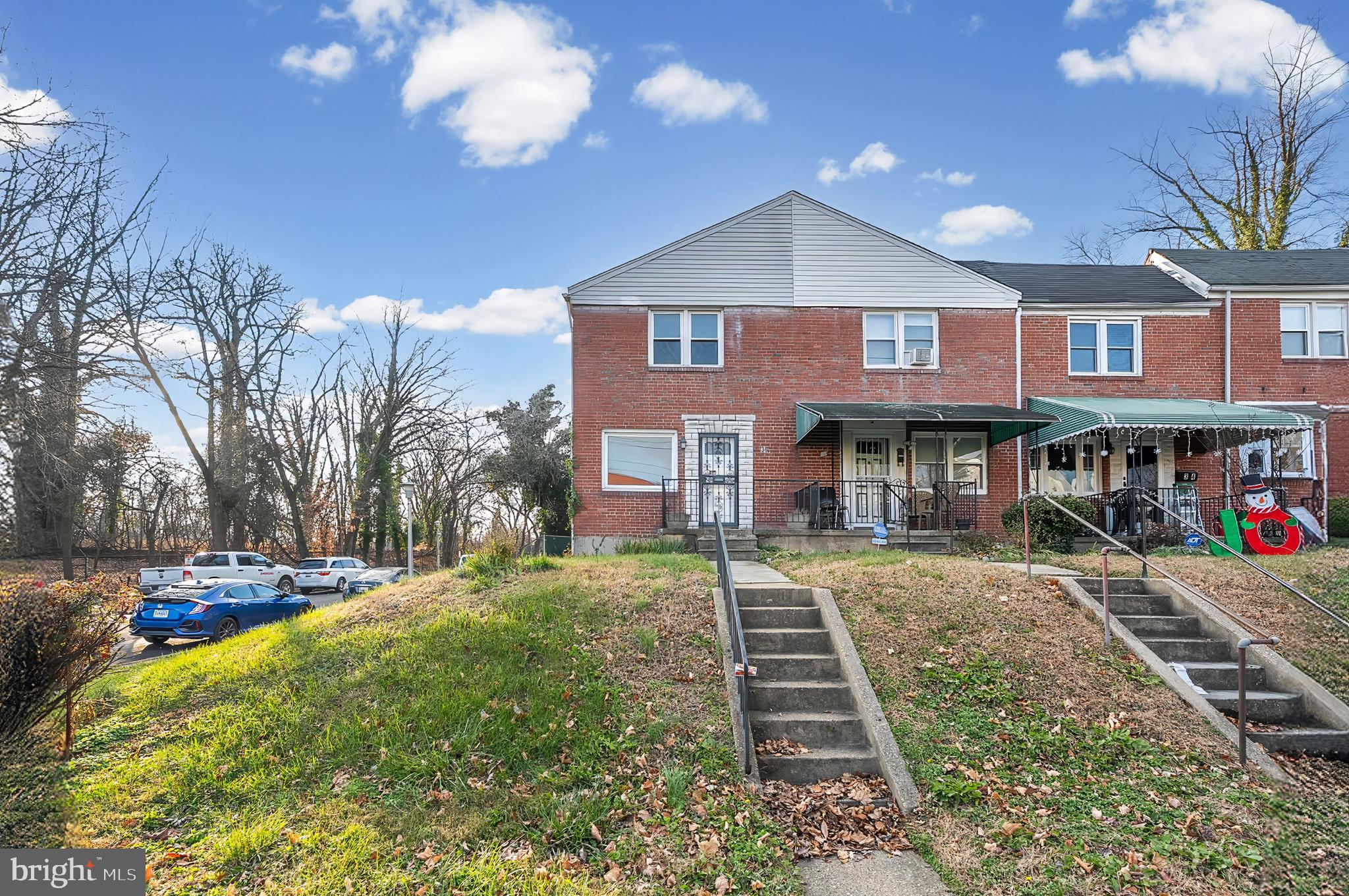30 North Athol Avenue Baltimore, MD 21229 - Photo 2 of 20 a front view of a brick building with many windows