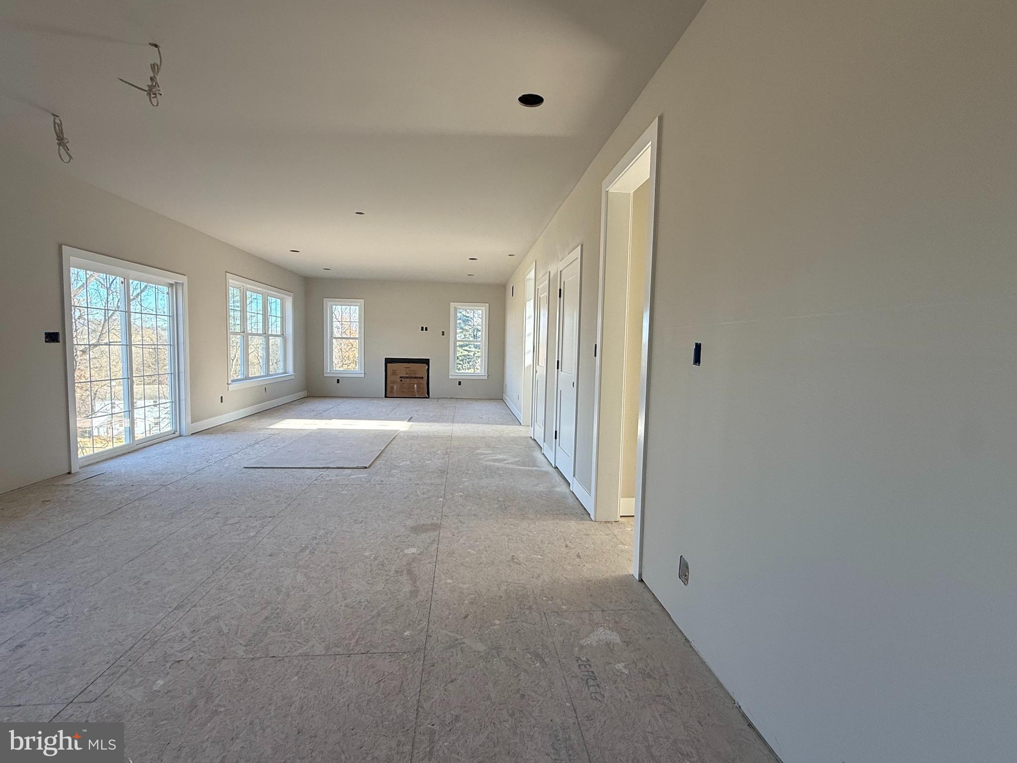 1935 Garden Station Road Avondale, PA 19311 - Photo 12 of 28 a view of a big room with windows and chandelier fan