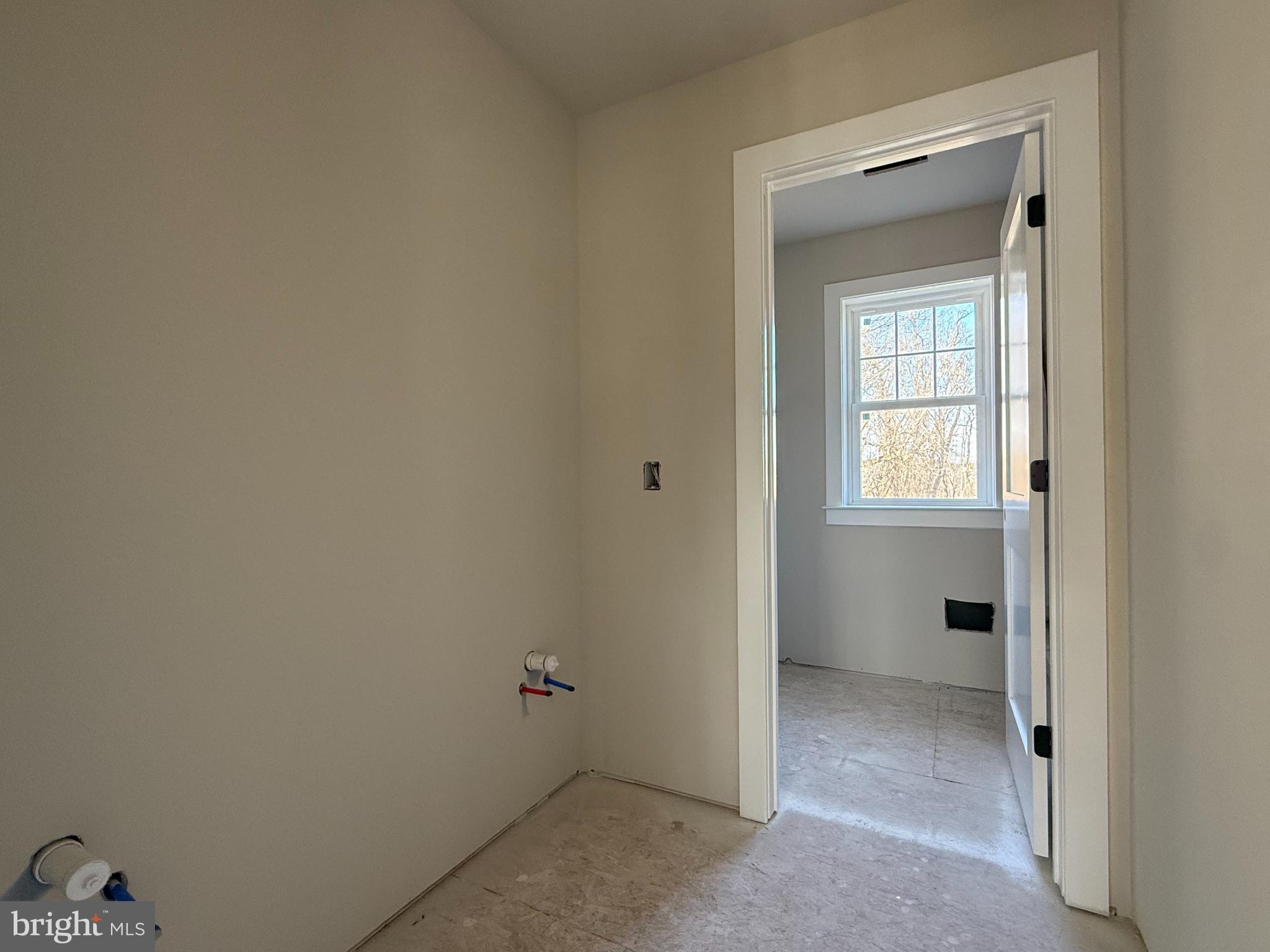 1935 Garden Station Road Avondale, PA 19311 - Photo 13 of 28 a view of an empty room with a closet and a window