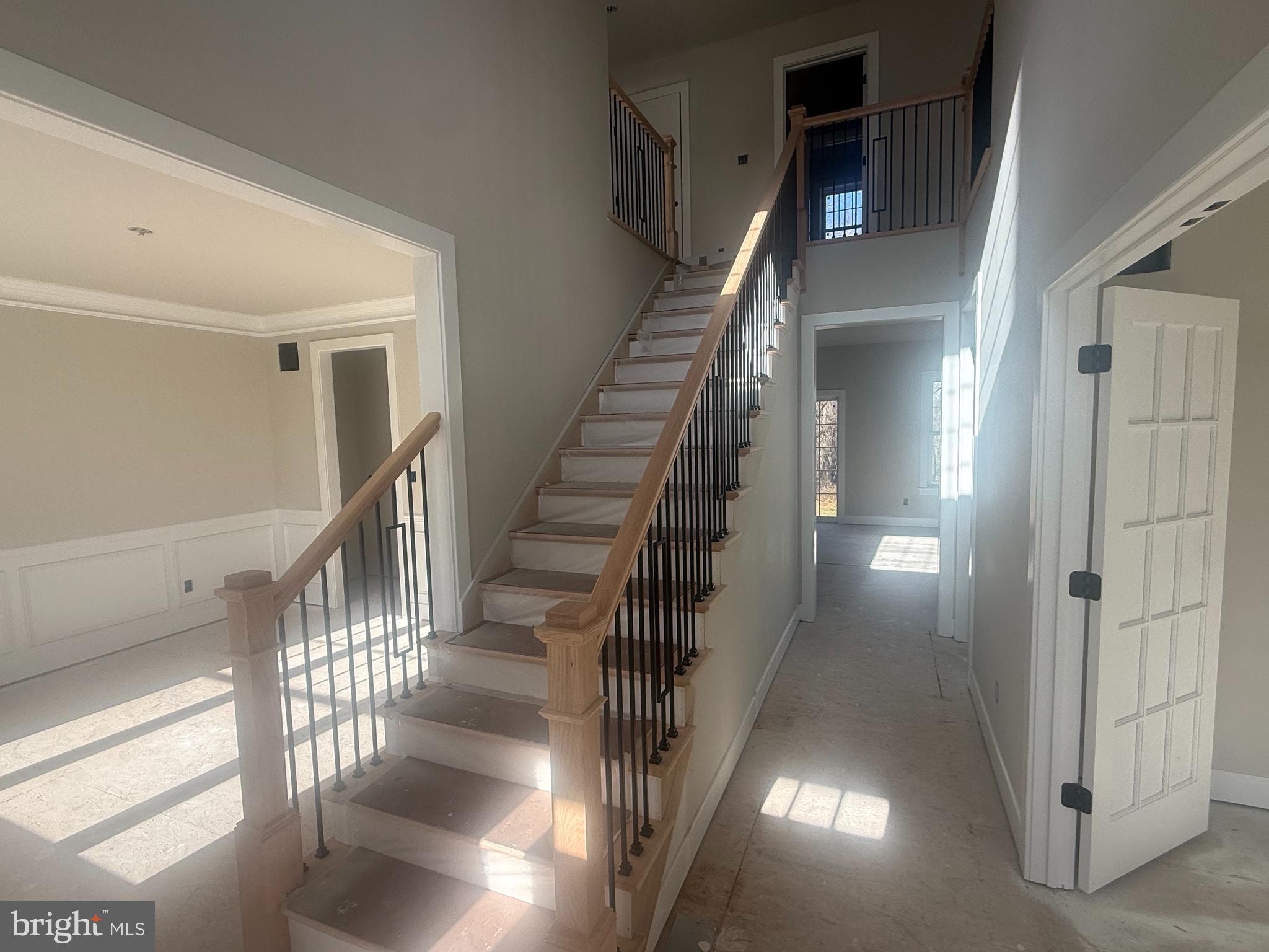 1935 Garden Station Road Avondale, PA 19311 - Photo 6 of 28 a view of staircase with lots of frames on wall and windows