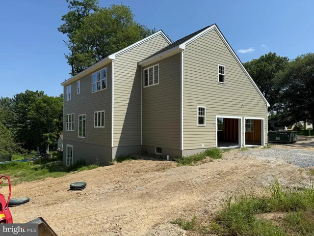 a view of a backyard of the house