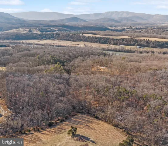 a view of a yard with mountain view