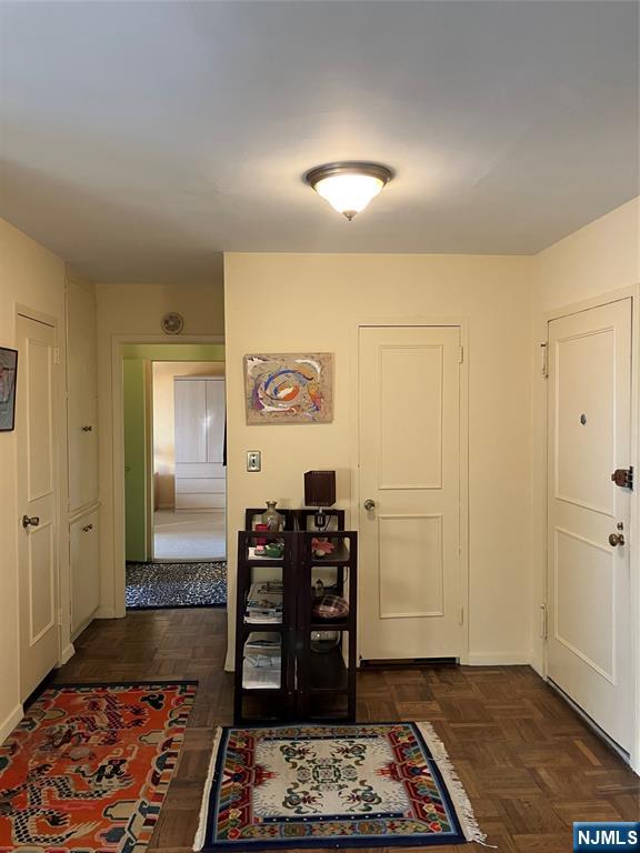 280 Prospect Avenue, Unit 11H Hackensack, NJ 07601 - Photo 5 of 20 a view of a hallway with workspace