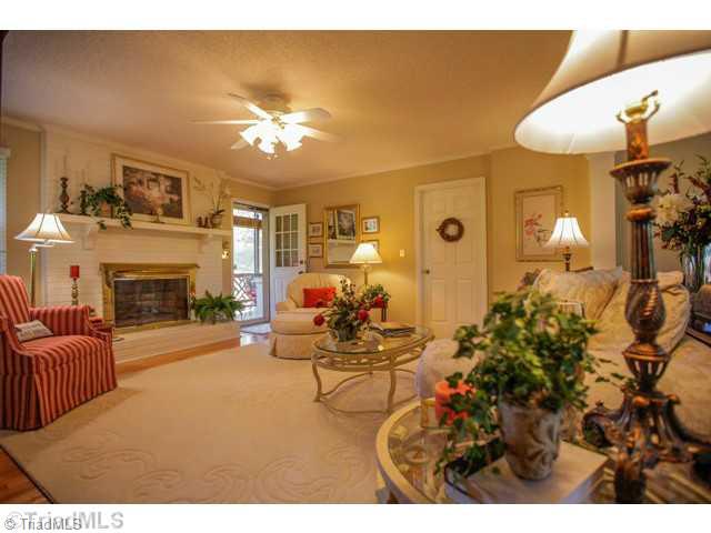 6973 Bridgewood Road Clemmons, NC 27012 - Photo 5 of 16 Living Room. Room looks out to a great screened porch and grilling deck
