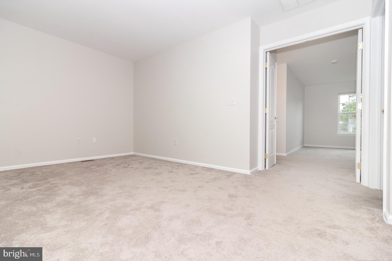 226 Hawthorne Way Riverside, NJ 08075 - Photo 15 of 32 an empty room with a natural light