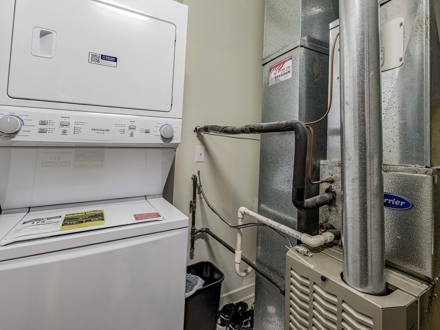 909 West Washington Boulevard, Unit 911 Chicago, IL 60607 - Photo 13 of 26 a utility room with dryer and washer