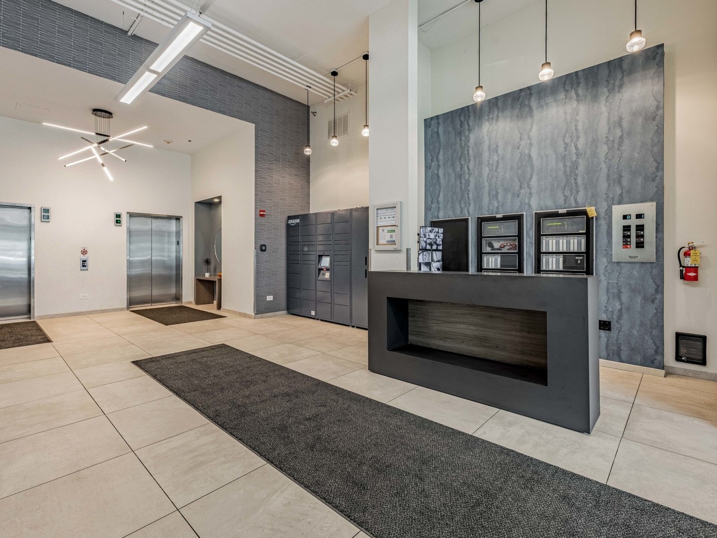 909 West Washington Boulevard, Unit 911 Chicago, IL 60607 - Photo 3 of 26 a open kitchen view with fireplace a refrigerator and ceiling fan