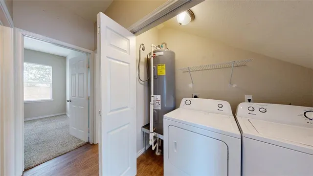 a view of a bathroom from a hallway