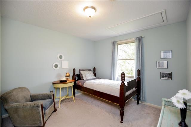 215 Lawrence Lane Springfield, TN 37172 - Photo 12 of 20 a bedroom with furniture and a window