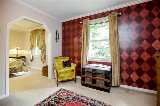 215 Lawrence Lane Springfield, TN 37172 - Photo 9 of 20 a bedroom with a bed and a mirror