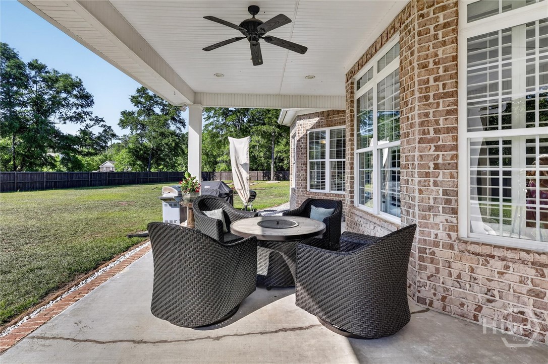 197 Cubbedge Drive Rincon, GA 31326 - Photo 35 of 43 Covered porch and grilling patio