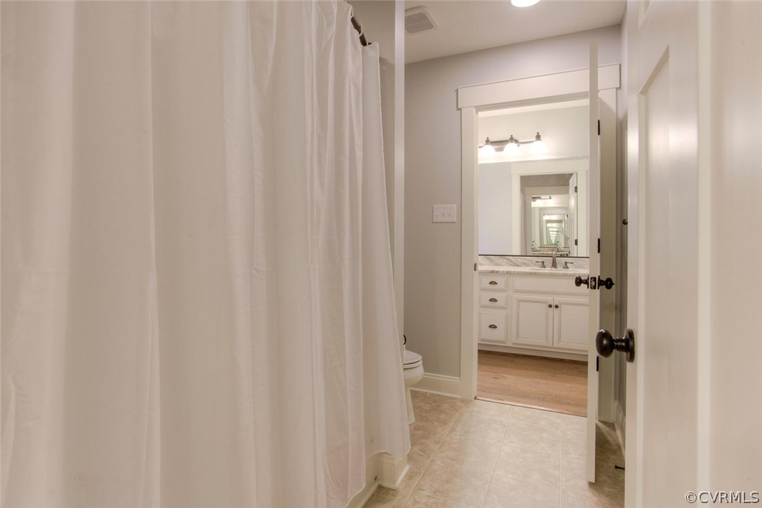 1870 Covington Road Crozier, VA 23039 - Photo 38 of 48 a bathroom with a sink and a mirror