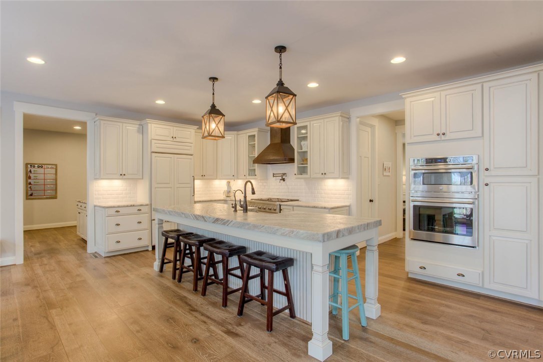 1870 Covington Road Crozier, VA 23039 - Photo 8 of 48 a kitchen with refrigerator and cabinets