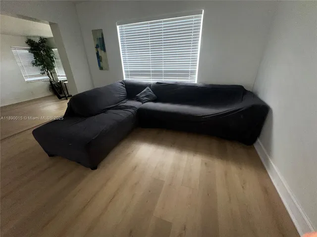 a bedroom with a bed and a cabinets