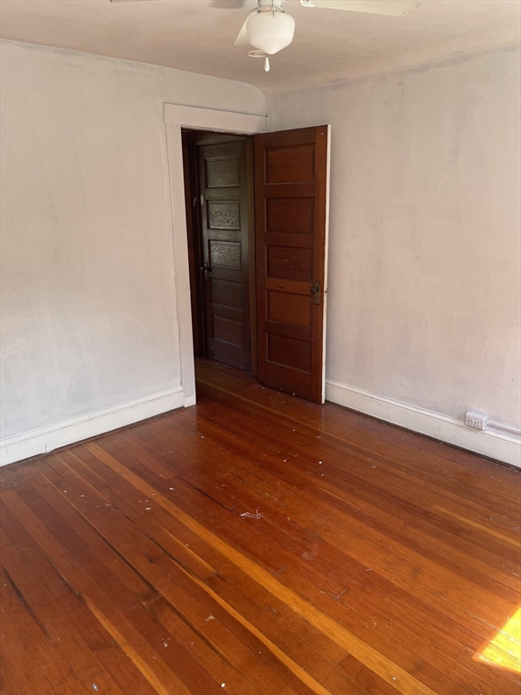245 Arthur Street Springfield, MA 01104 - Photo 19 of 20 a view of empty room with wooden floor
