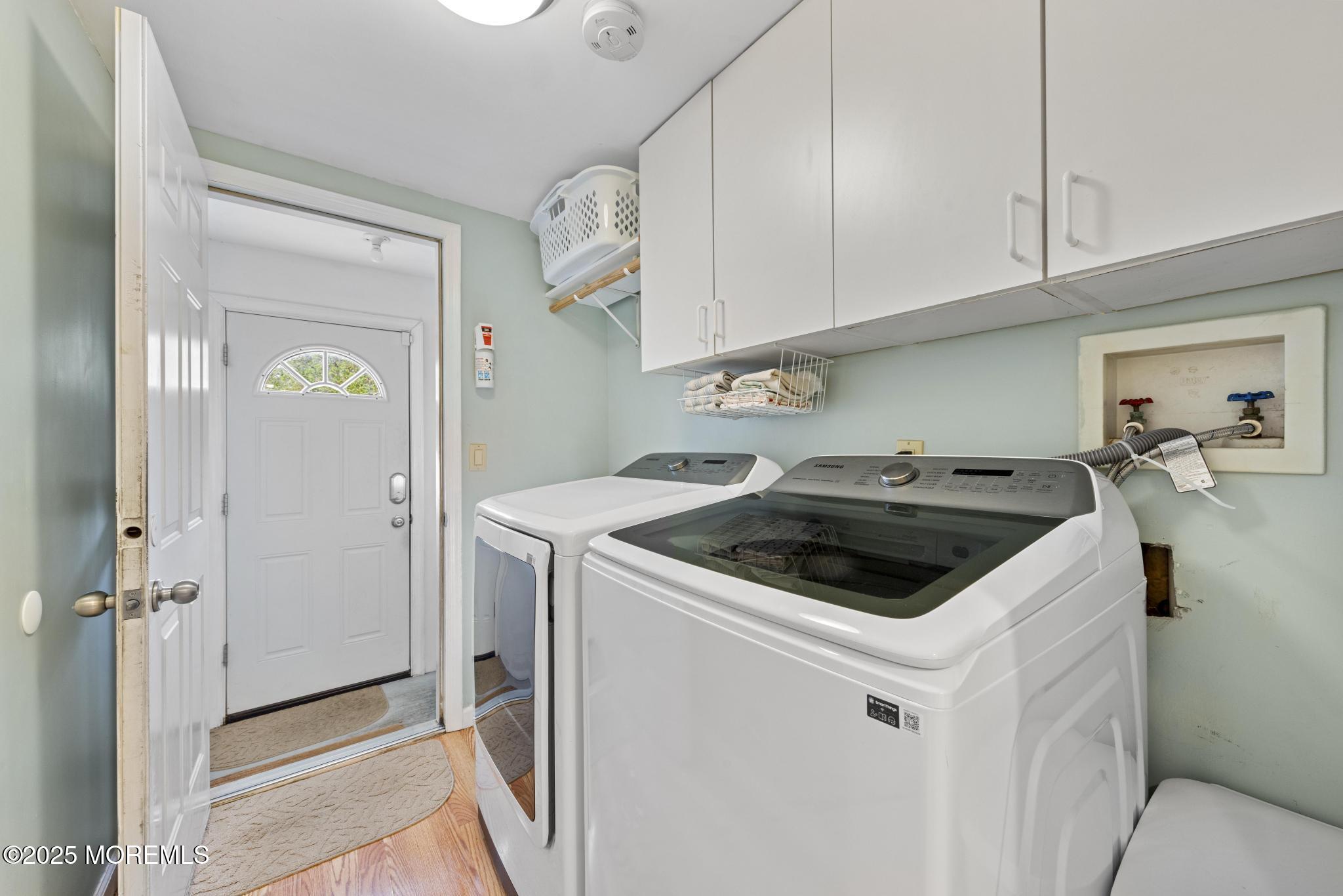 1704 Grove Street Wall, NJ 07719 - Photo 19 of 53 a kitchen that has a sink and a stove