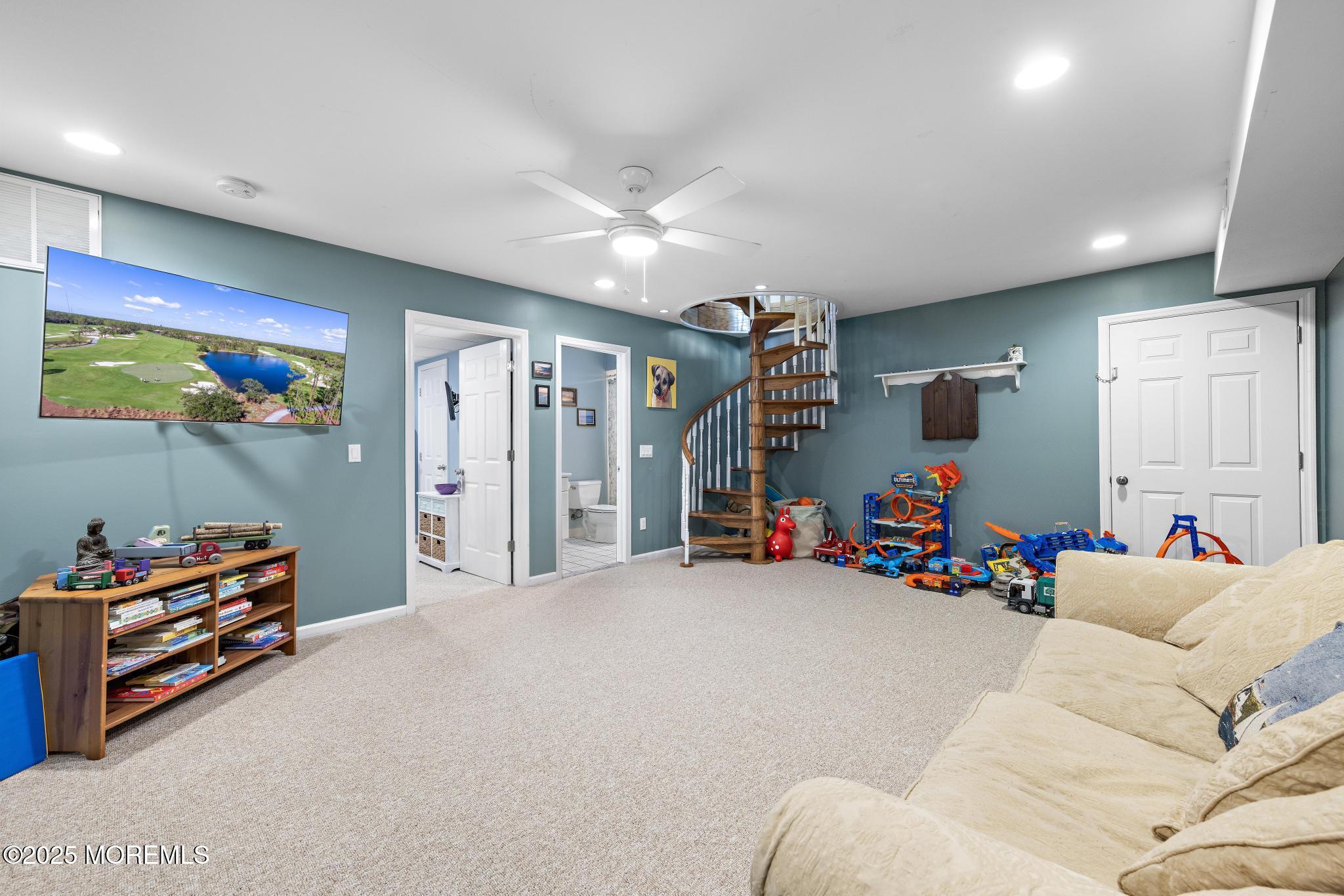 1704 Grove Street Wall, NJ 07719 - Photo 32 of 53 a bedroom with furniture and a fan