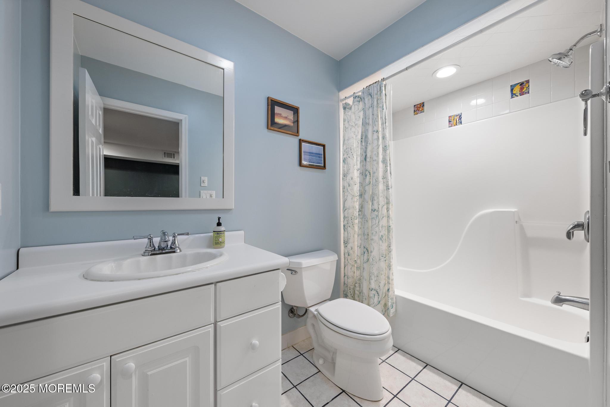 1704 Grove Street Wall, NJ 07719 - Photo 34 of 53 a bathroom with a sink a toilet and shower