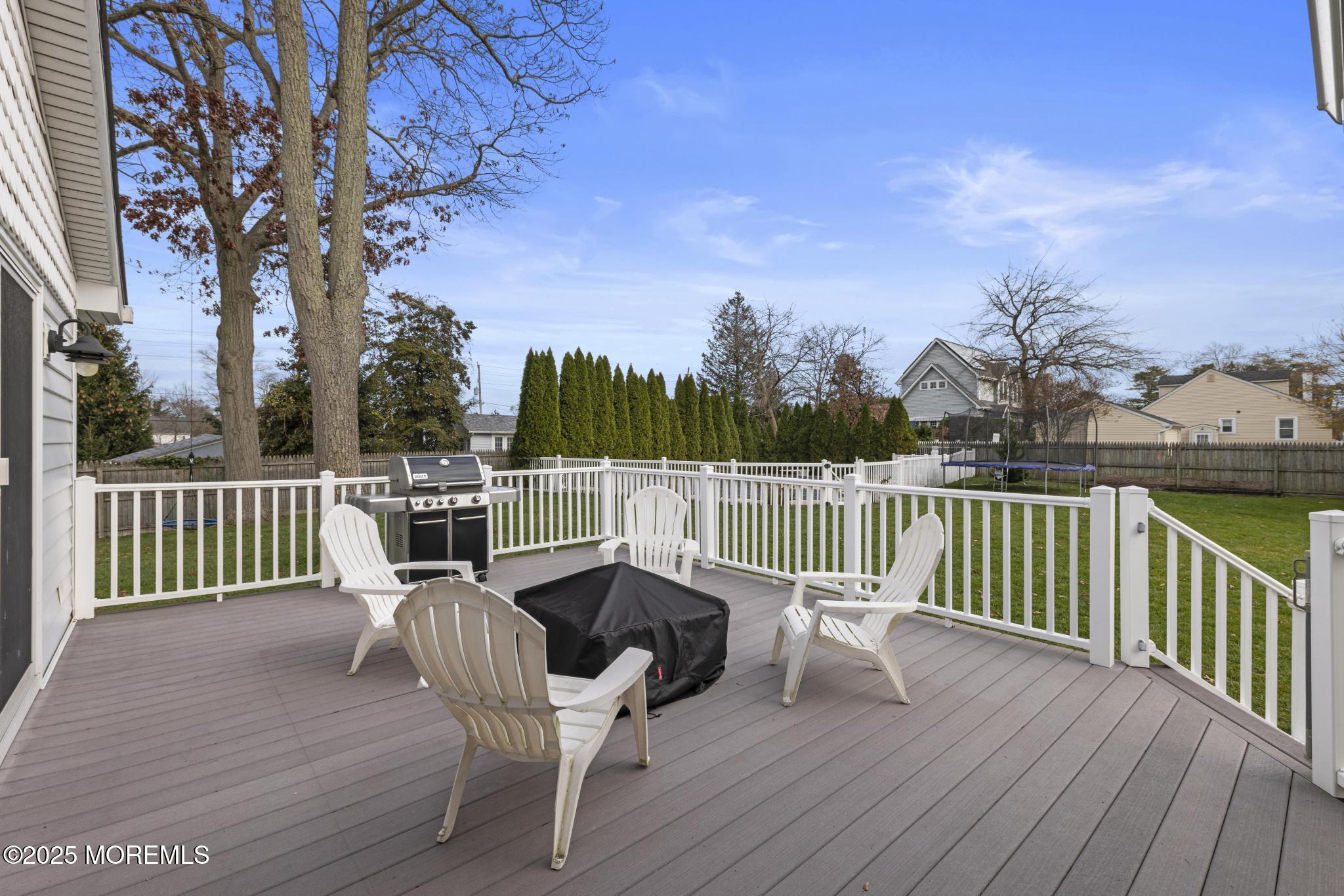 1704 Grove Street Wall, NJ 07719 - Photo 36 of 53 a view of a chairs on a deck