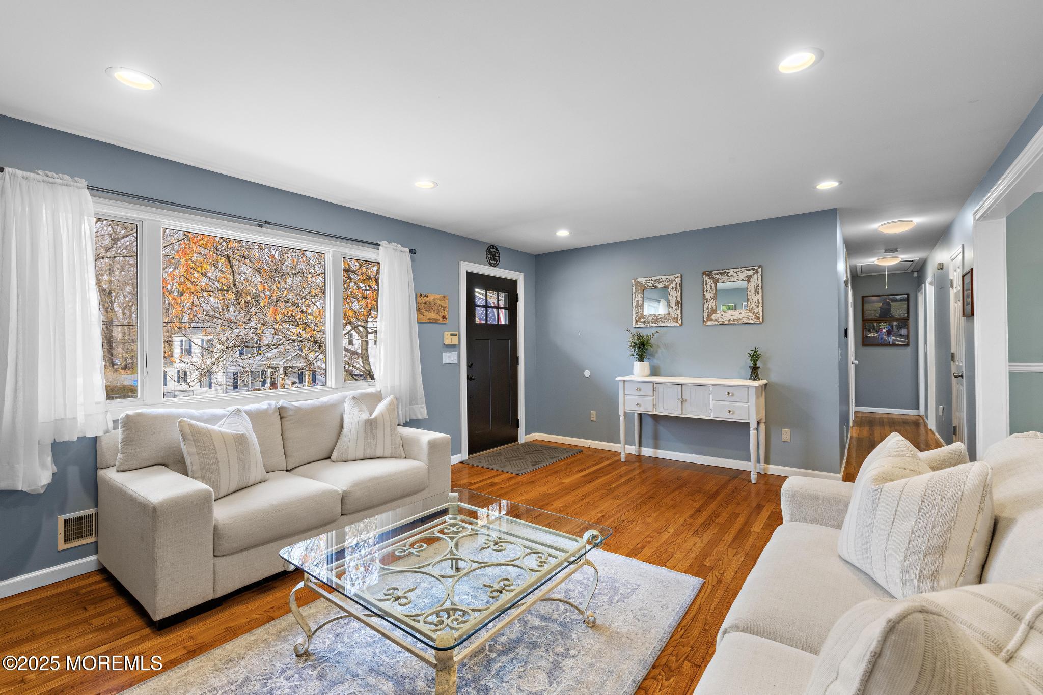 1704 Grove Street Wall, NJ 07719 - Photo 4 of 53 a living room with furniture and a large window