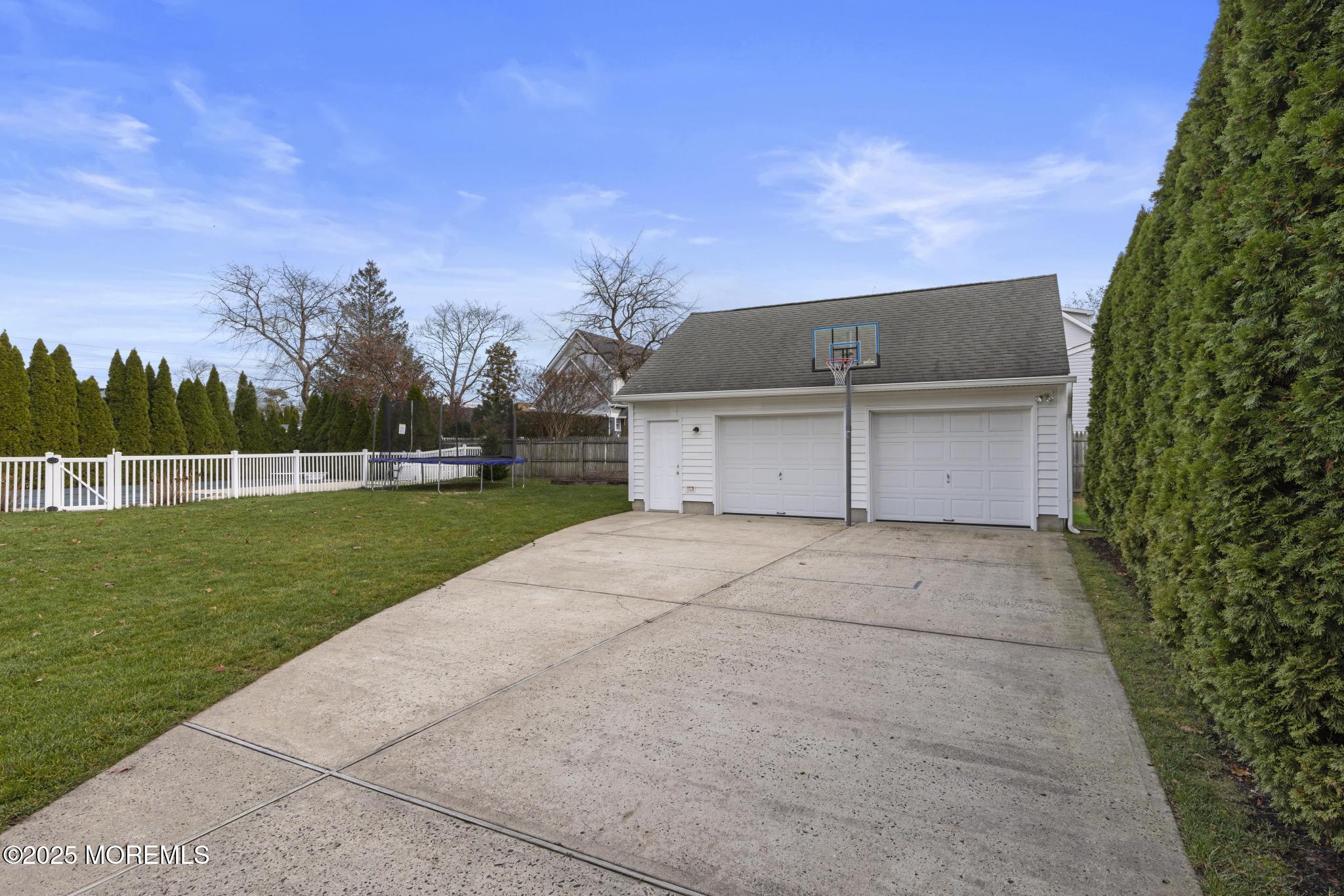 1704 Grove Street Wall, NJ 07719 - Photo 46 of 53 a front view of a house with a yard
