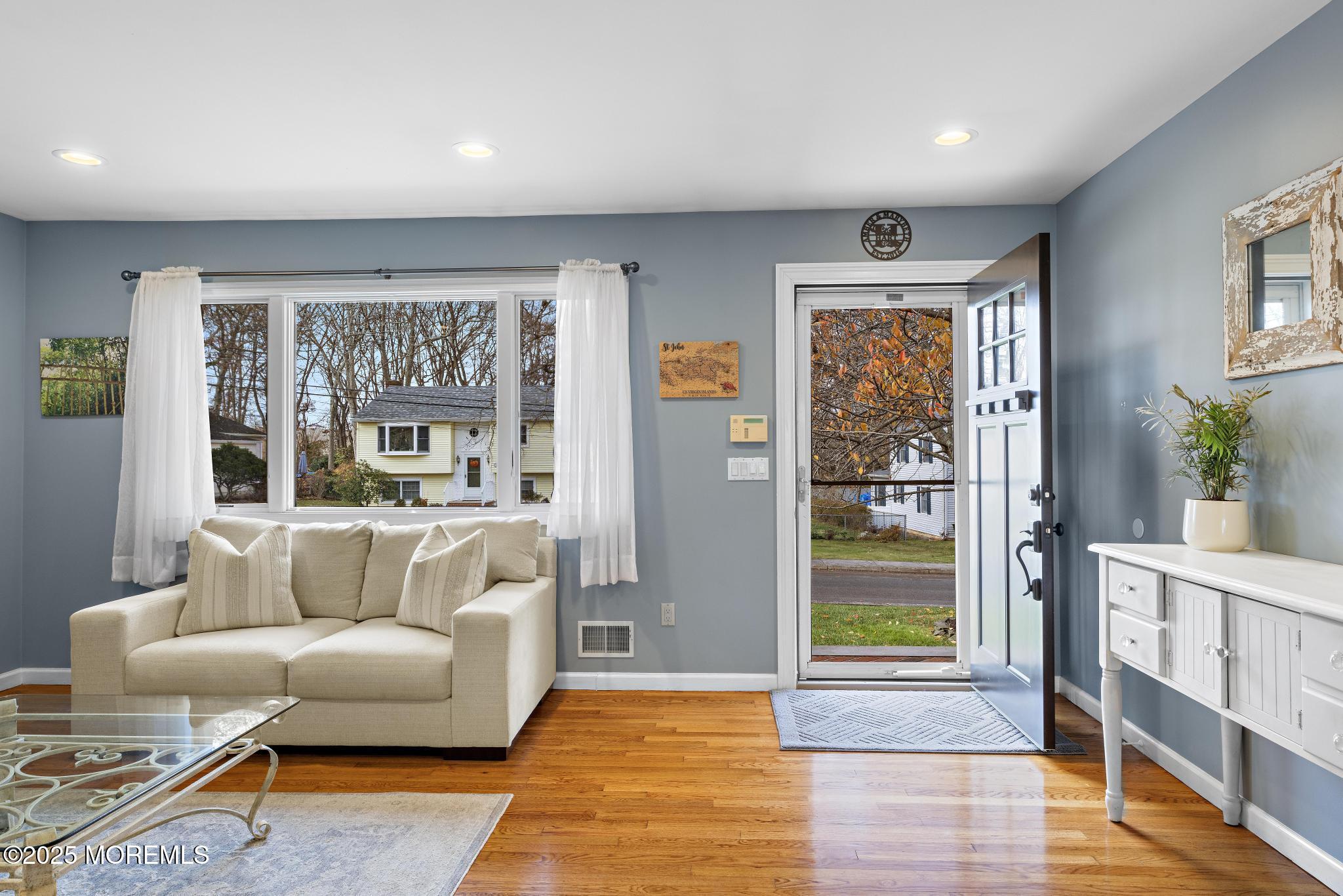 1704 Grove Street Wall, NJ 07719 - Photo 5 of 53 a living room with furniture and a window