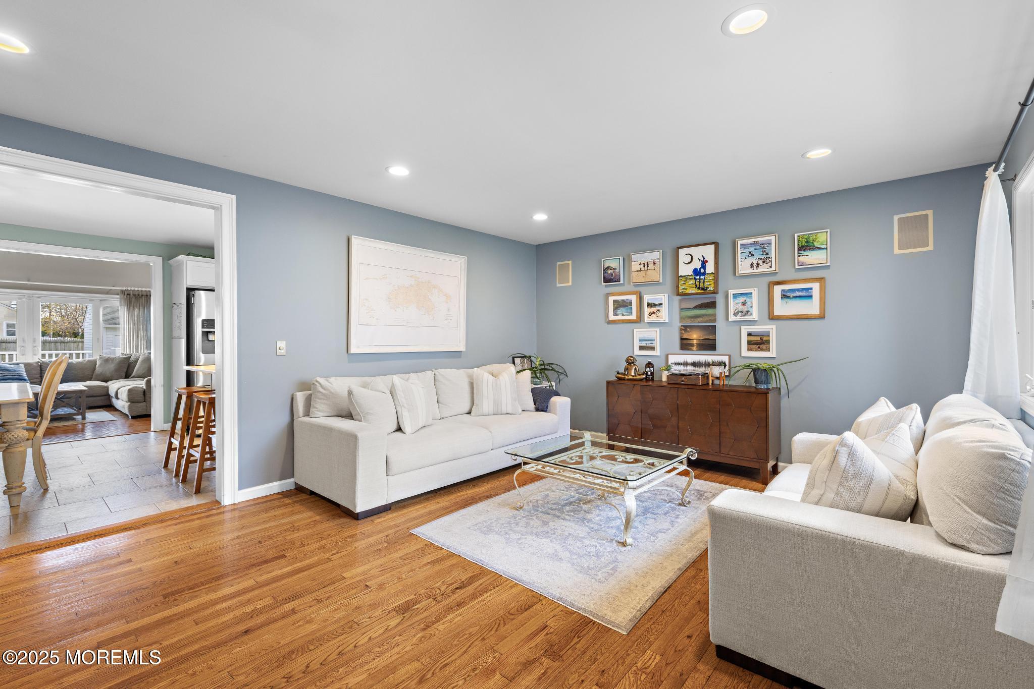 1704 Grove Street Wall, NJ 07719 - Photo 7 of 53 a living room with furniture and a wooden floor
