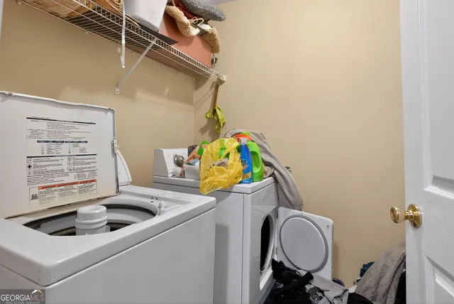 a workspace with wooden floor and stairs