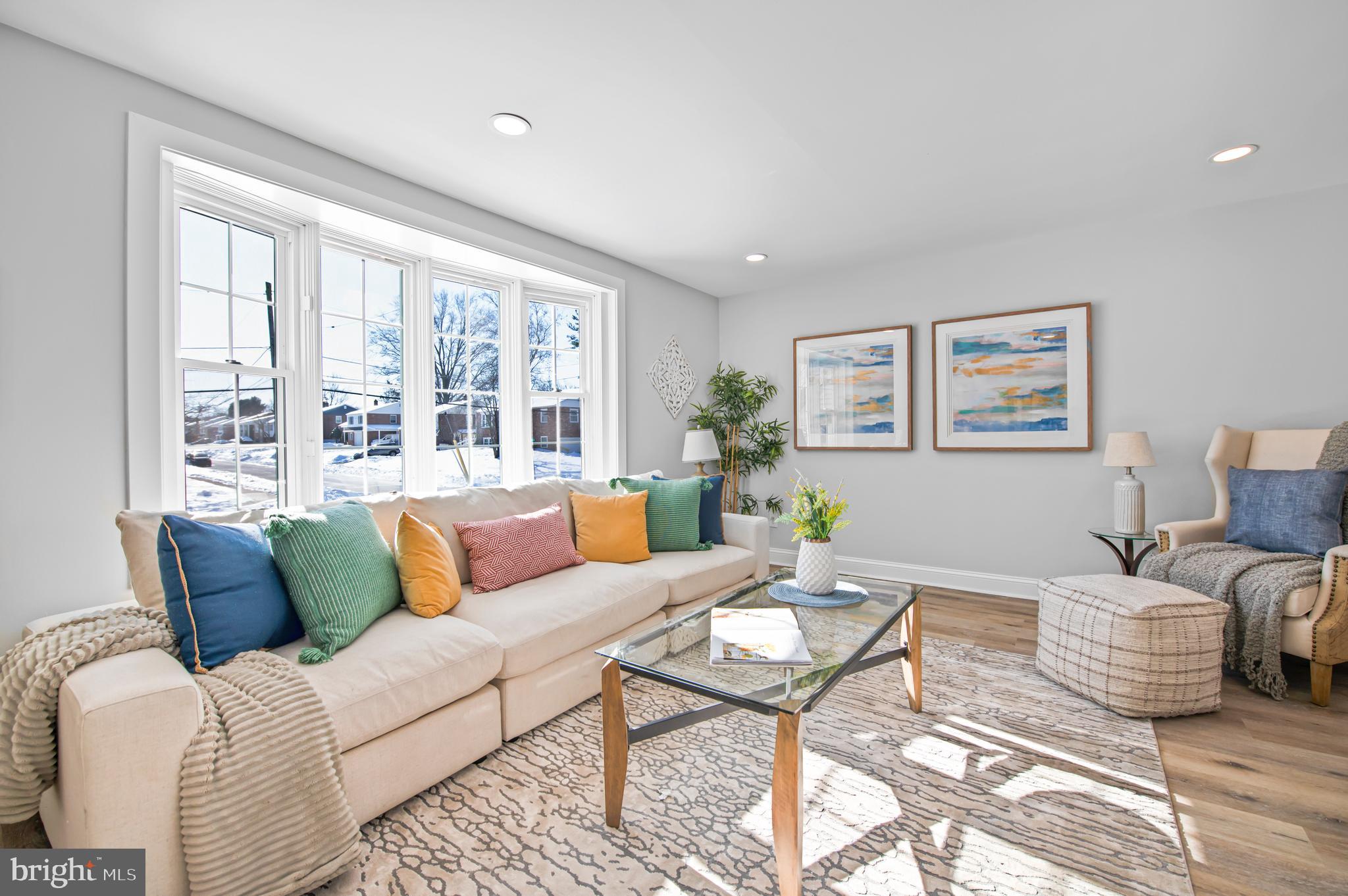 356 Abrams Mill Road King of Prussia, PA 19406 - Photo 13 of 46 a living room with furniture and a large window