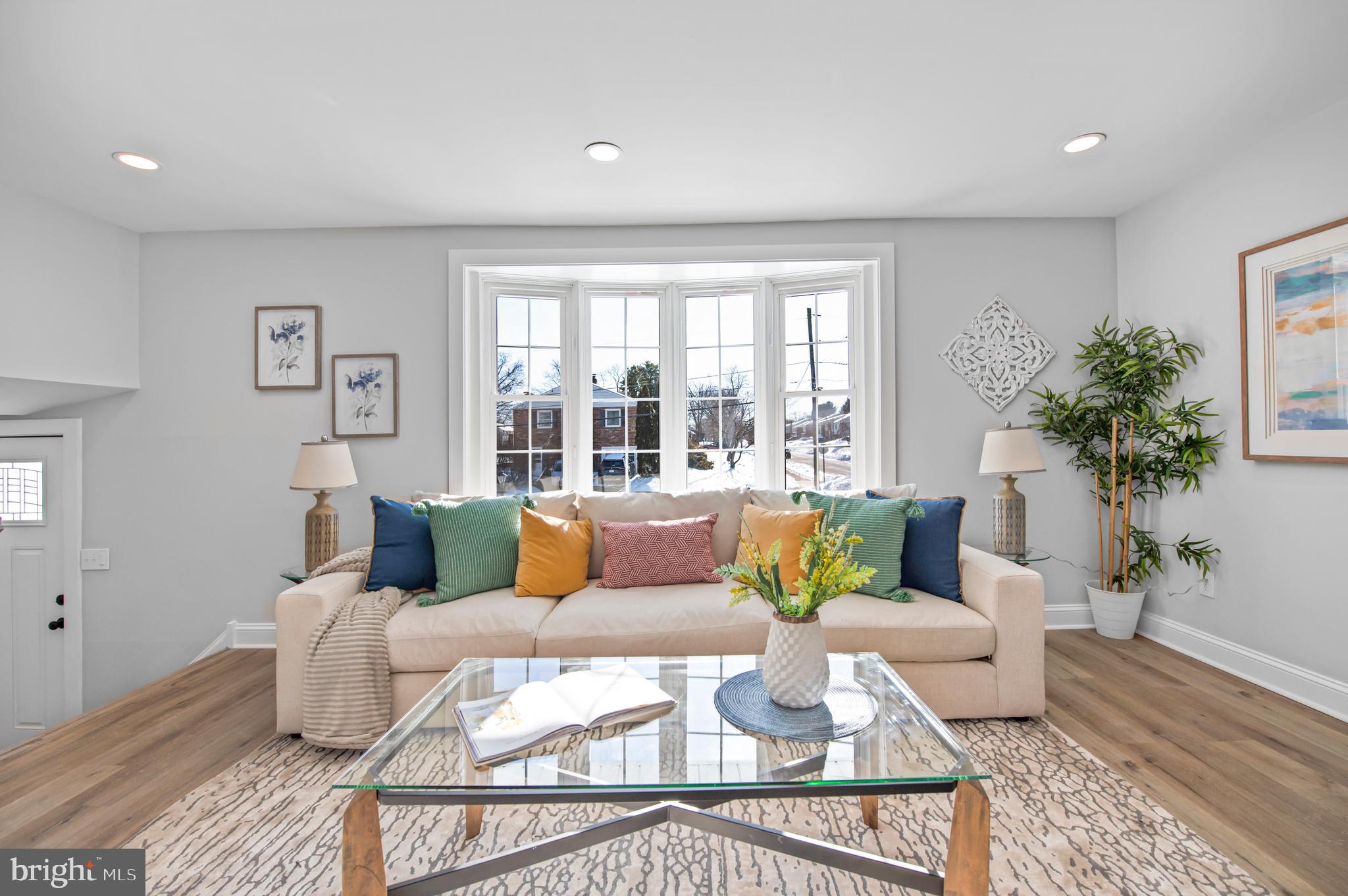 356 Abrams Mill Road King of Prussia, PA 19406 - Photo 15 of 46 a living room with furniture and a large window
