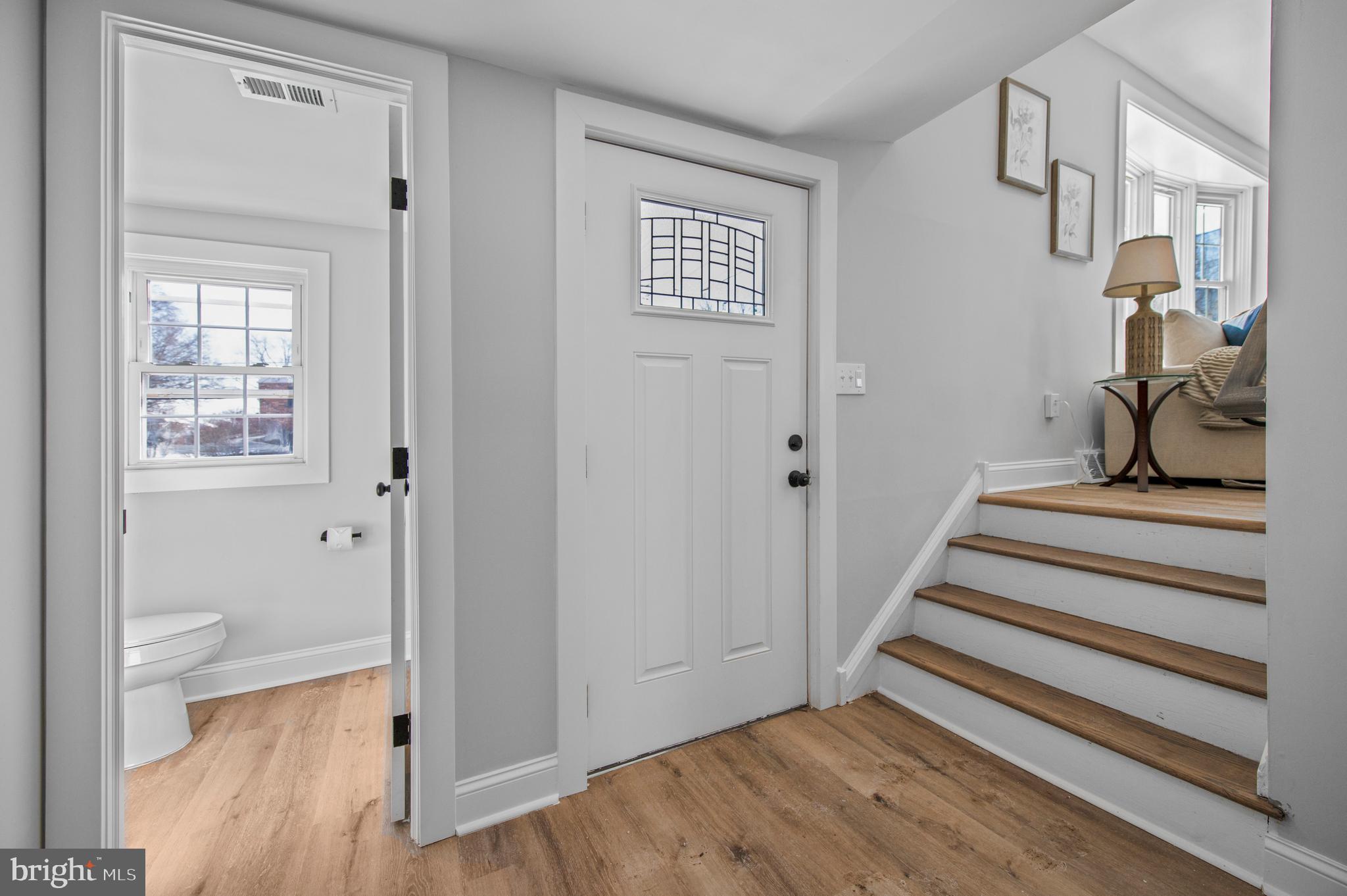 356 Abrams Mill Road King of Prussia, PA 19406 - Photo 23 of 46 a view of a hallway with wooden floor and windows