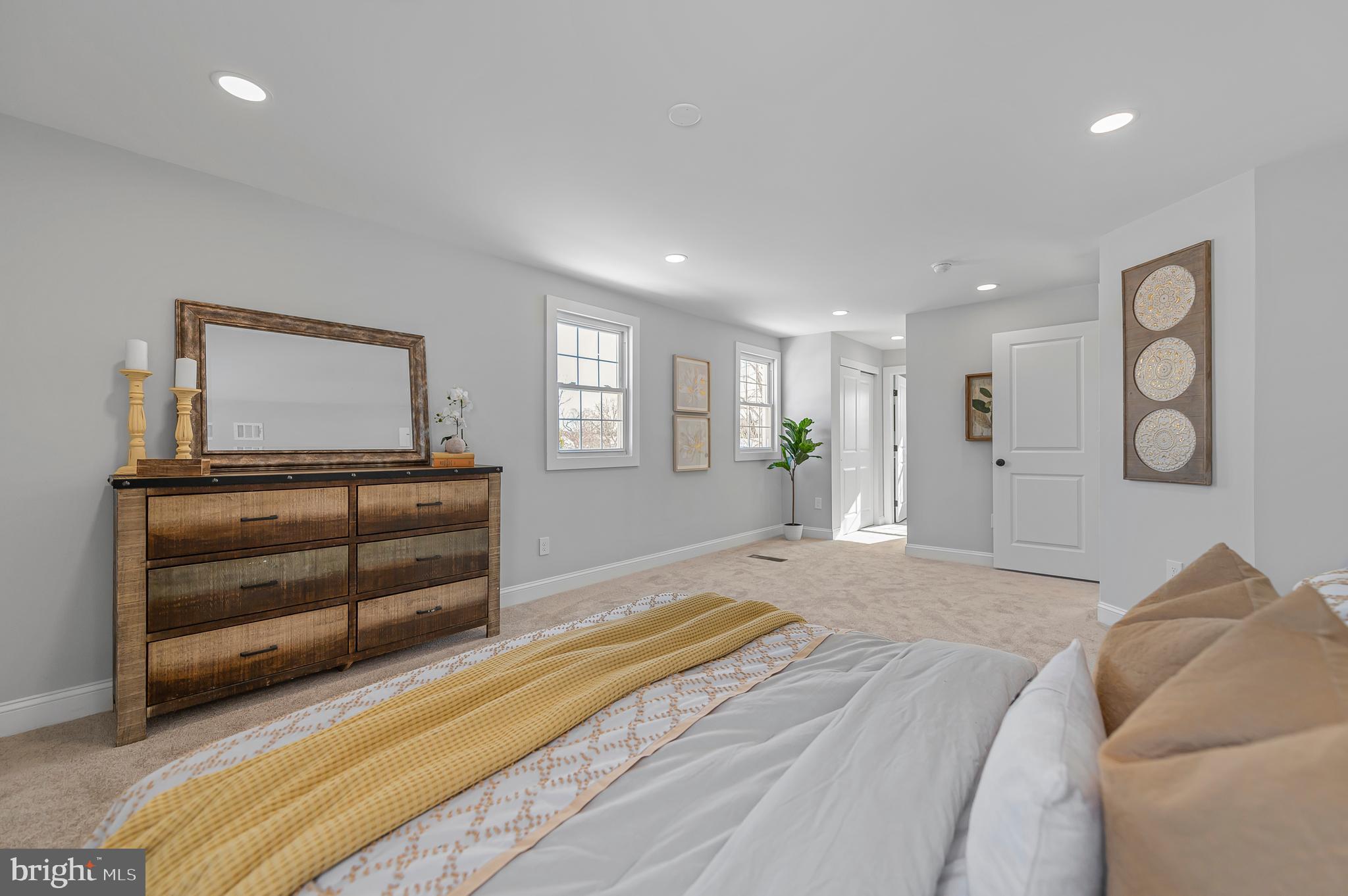 356 Abrams Mill Road King of Prussia, PA 19406 - Photo 29 of 46 a spacious bedroom with a bed and a dresser