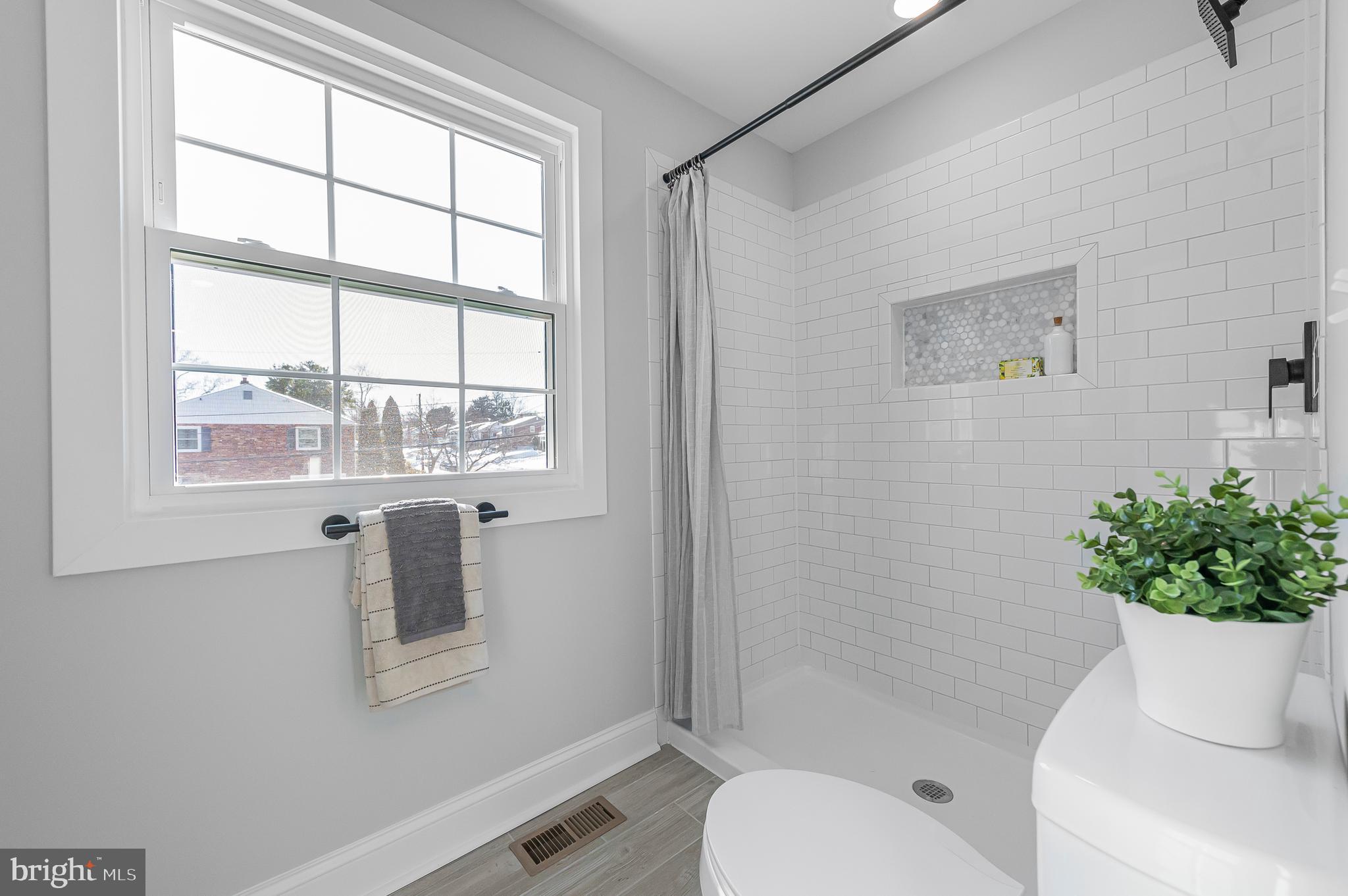 356 Abrams Mill Road King of Prussia, PA 19406 - Photo 31 of 46 a bathroom with a toilet and a shower