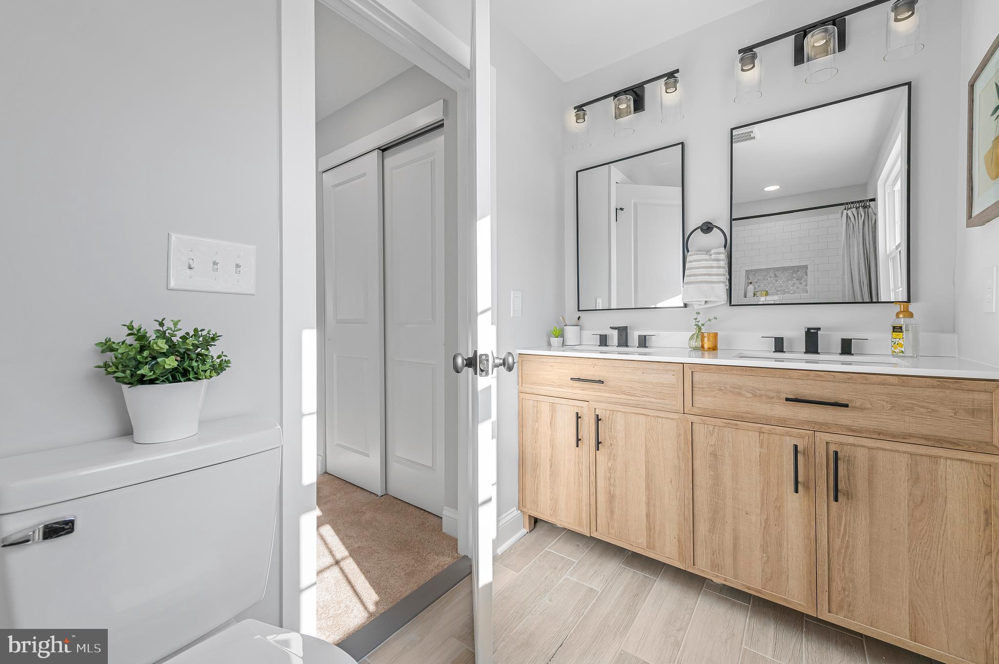 356 Abrams Mill Road King of Prussia, PA 19406 - Photo 32 of 46 a bathroom with a sink and a mirror