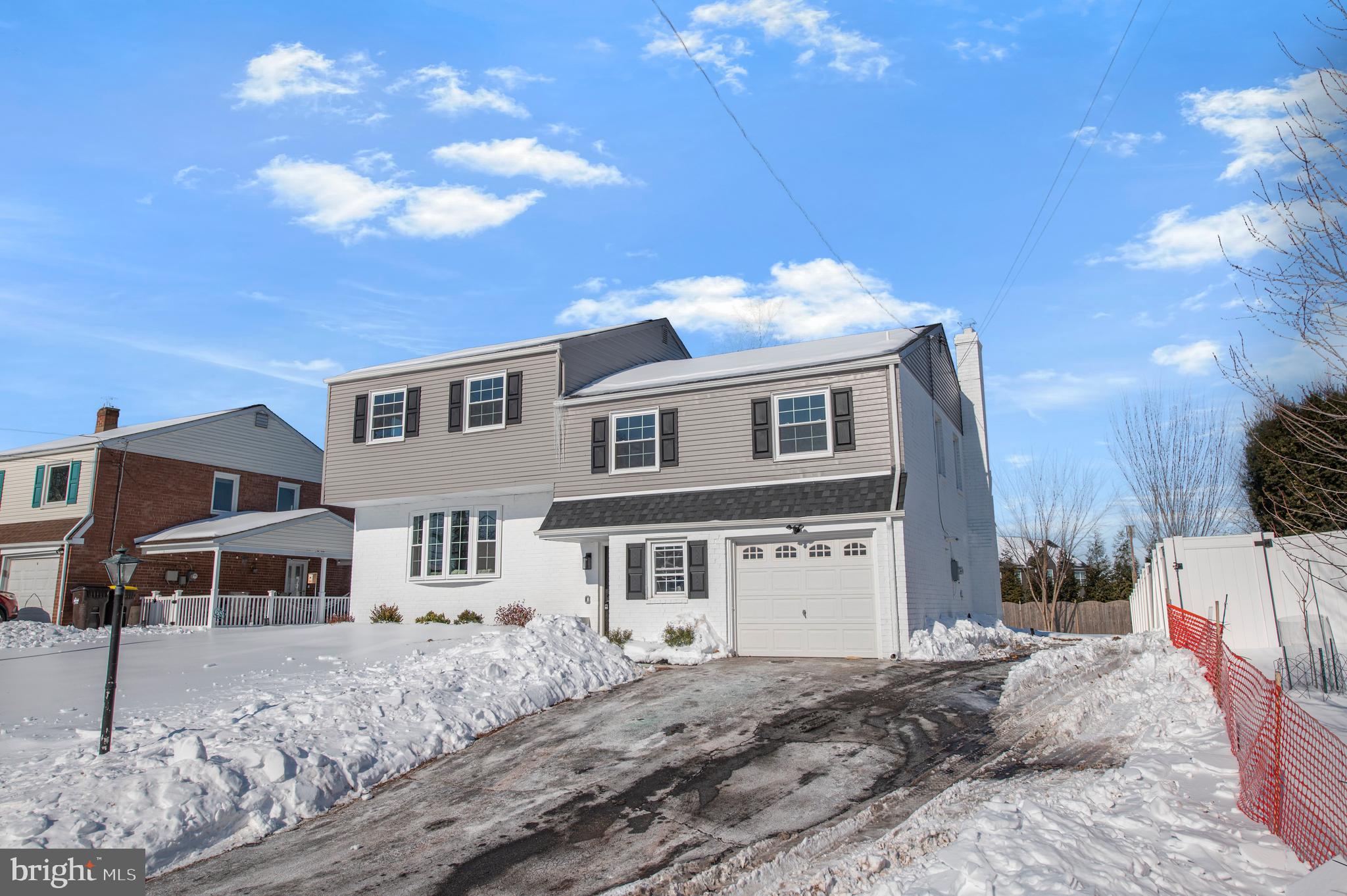 356 Abrams Mill Road King of Prussia, PA 19406 - Photo 42 of 46 a front view of a house with a yard