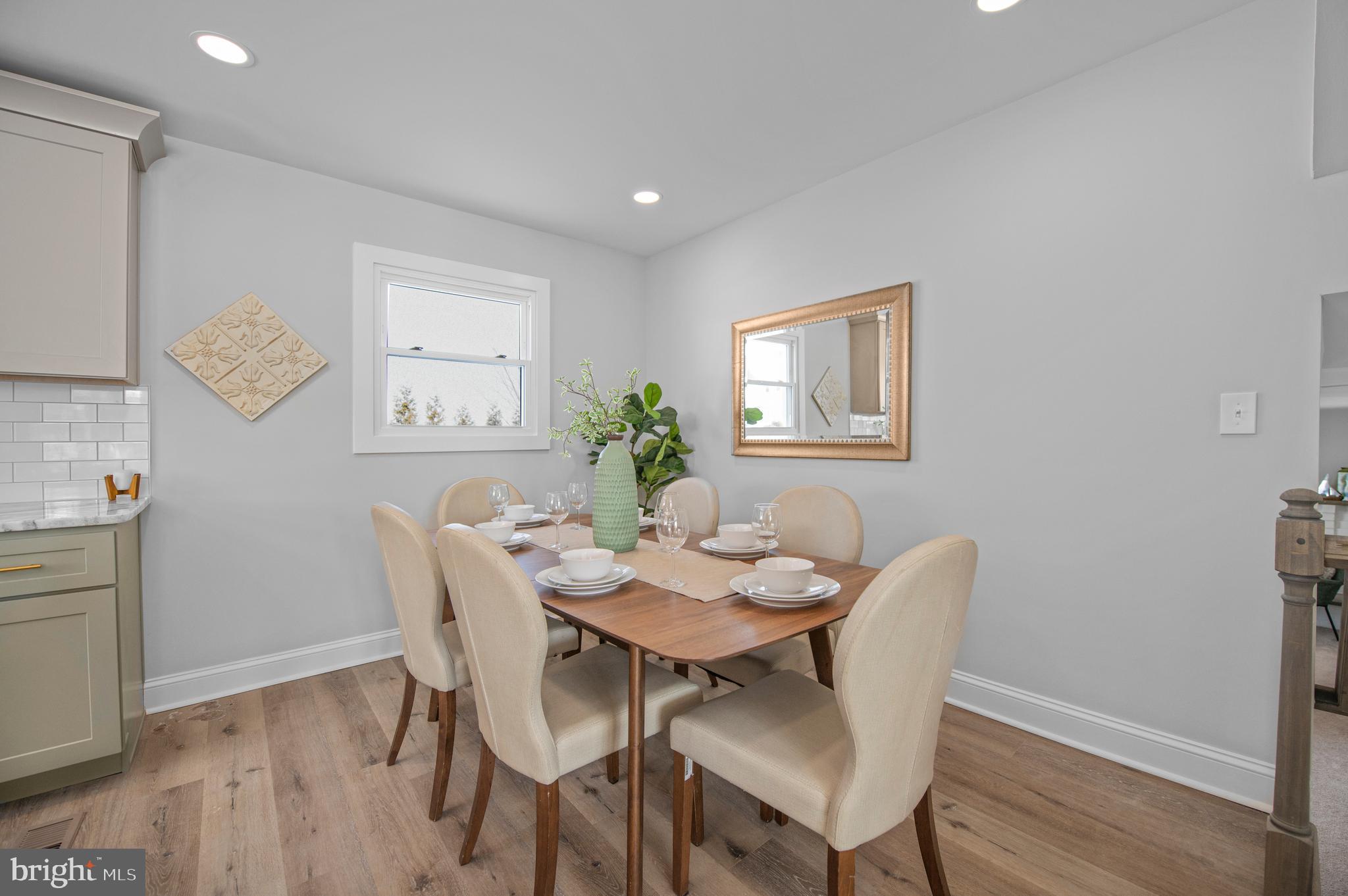 356 Abrams Mill Road King of Prussia, PA 19406 - Photo 10 of 46 a view of a dining room with furniture and wooden floor