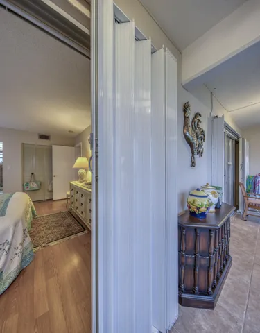 a kitchen with stainless steel appliances granite countertop a sink stove refrigerator and cabinets