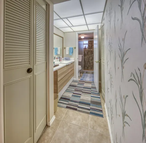 a bathroom with a bathtub and shower