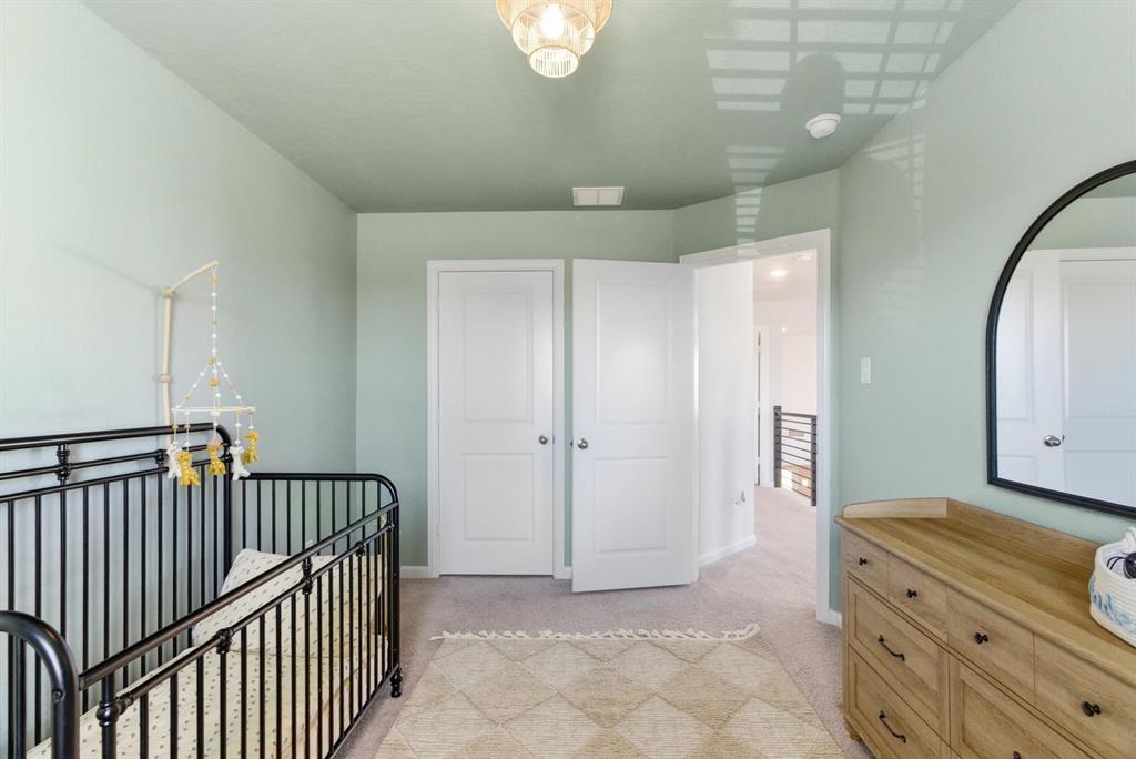 2002 Bronte Dr. Forney, TX 75126 - Photo 24 of 34 a view of a hallway with a bathroom